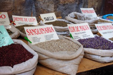 Spices at the oriental market in granada, spain clipart