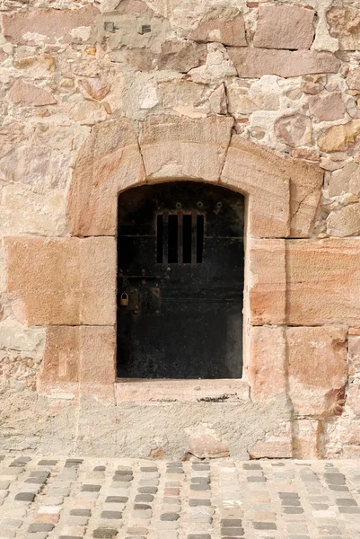 Closed metal door in an ancient fortress, Barcelona Spain — Stock Photo, Image
