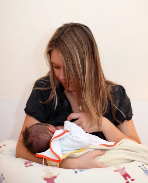 Newborn baby breast feeding — Stock Photo, Image