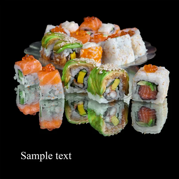 Set of japanese sushi on black background — Stock Photo, Image