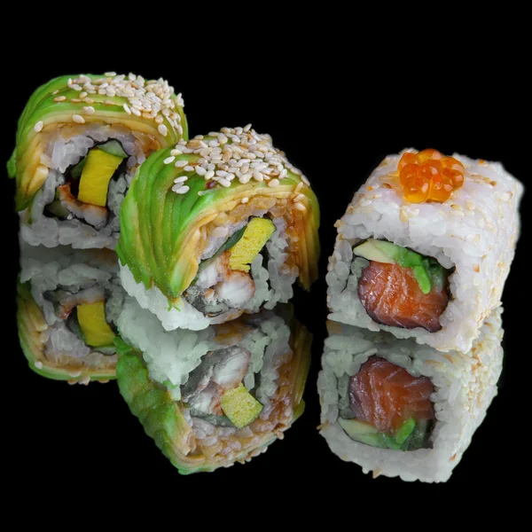 Set of ready to eat sushi isolated on black — Stock Photo, Image