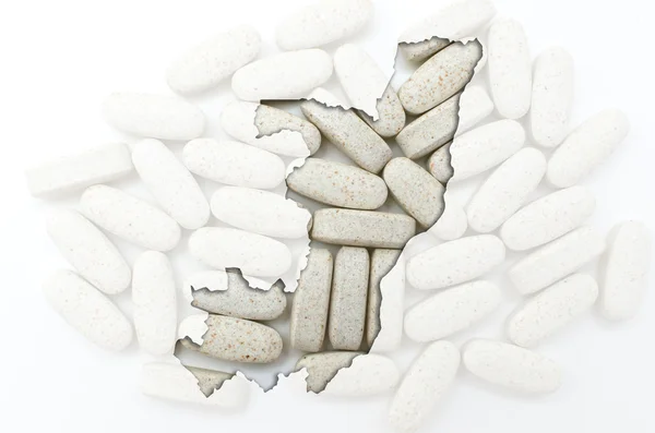 Outline map of congo with pills in the background for health and — Stock Photo, Image