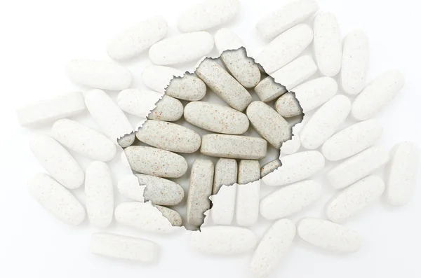 Outline map of lesotho with pills in the background for health a — Stock Photo, Image