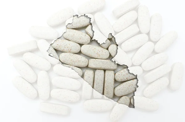 Outline map of liberia with pills in the background for health a — Stock Photo, Image