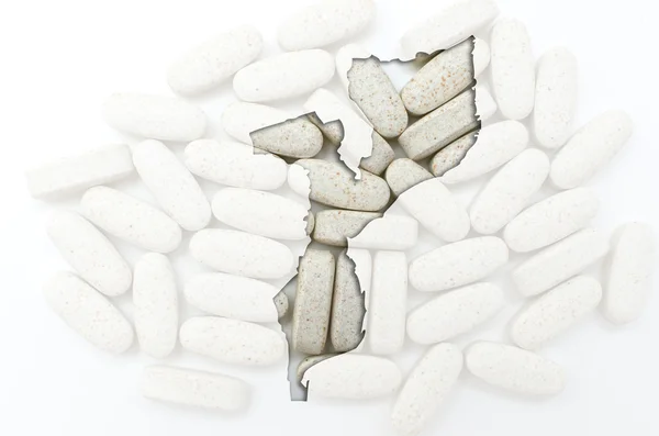 Umrisskarte von Mosambik mit Pillen im Hintergrund zur Heilung — Stockfoto
