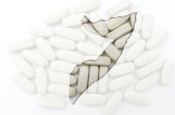 Outline map of somalia with pills in the background for health a — Stock Photo, Image
