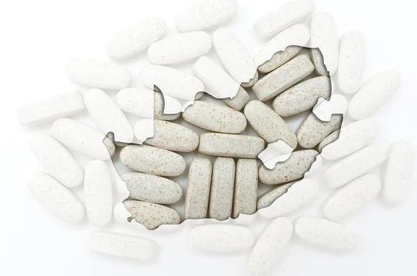 Outline map of south africa with pills in the background for hea — Stock Photo, Image