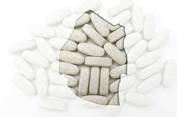 Szváziföld körvonala tabletták a háttérben, az egészségügyi — Stock Fotó