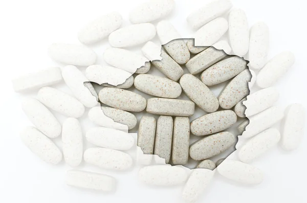 Konturkarta över zimbabwe med piller i bakgrunden för hälsa — Stockfoto