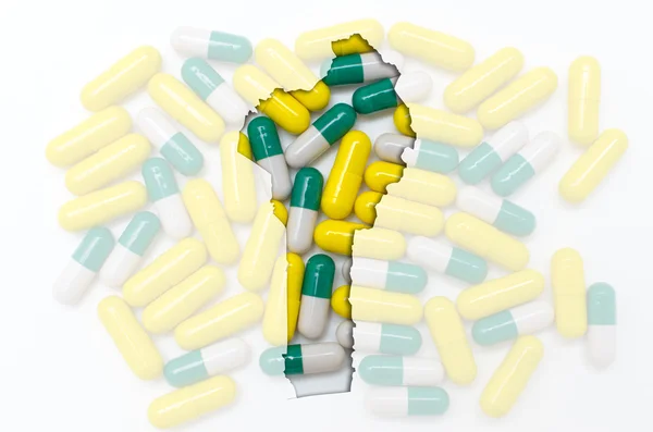 Overzicht kaart van benin met pillen op de achtergrond voor gezondheid en — Stockfoto