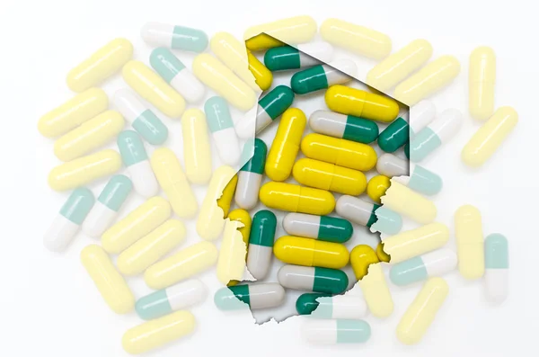Umrisskarte von chad mit Pillen im Hintergrund für Gesundheit und — Stockfoto