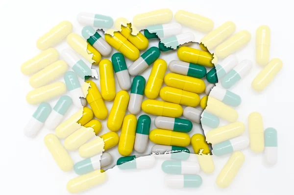 Konturkarta över cote'd ivore med piller i bakgrunden för hea — Stockfoto