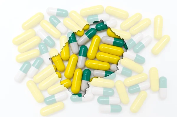 Tablettákat, a háttérben a egészségügyi szerkezeti lesotho Térkép egy — Stock Fotó