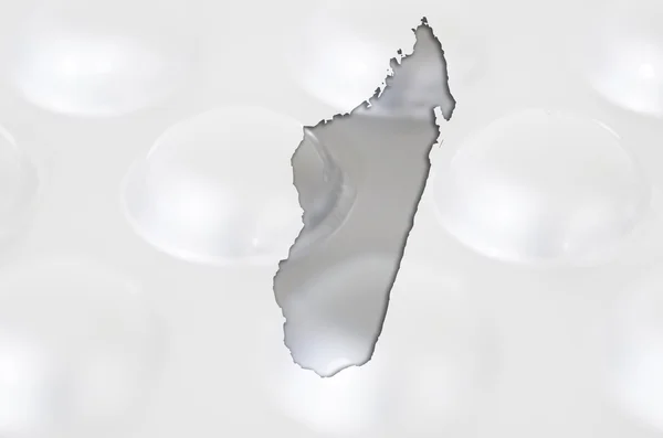 大纲地图的马达加斯加与背景为卫生丸 — 图库照片