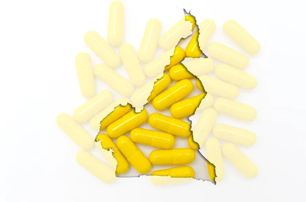 Übersichtskarte von Kamerun mit Pillen im Hintergrund für die Gesundheit — Stockfoto