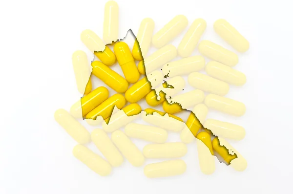 Overzicht-kaart van eritrea met pillen op de achtergrond voor de gezondheid van een — Stockfoto