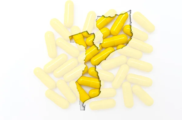 Mapa do esboço de moçambique com pílulas no fundo para healt — Fotografia de Stock