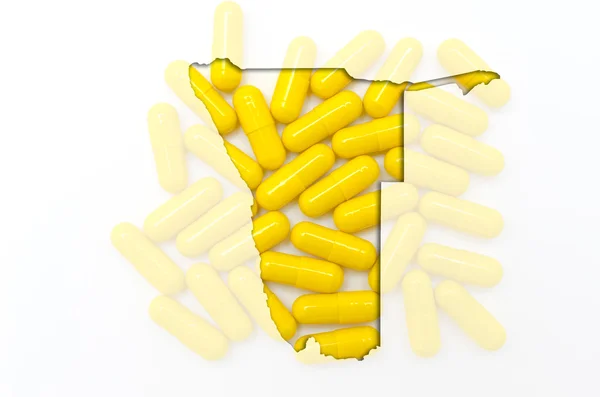 Outline map of namibia with pills in the background for health a — Stock Photo, Image