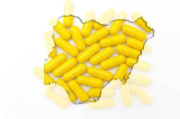 Tablettákat, a háttérben a egészségügyi szerkezeti Nigéria Térkép egy — Stock Fotó