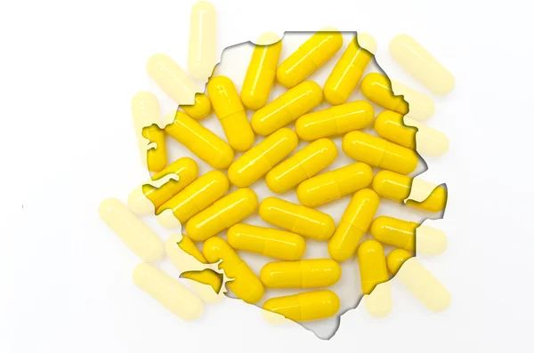 A tabletták, a háttérben a hea szerkezeti sierra leone Térkép — Stock Fotó