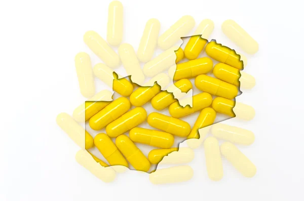 Umrisskarte von Sambia mit Pillen im Hintergrund für Gesundheit und — Stockfoto