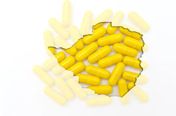 Outline map of zimbabwe with pills in the background for health — Stock Photo, Image
