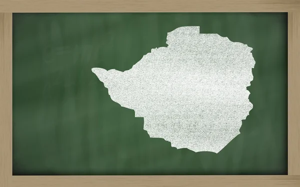 Outline map of zimbabwe on blackboard — Stock Photo, Image