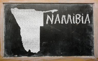 Outline map of namibia on blackboard clipart