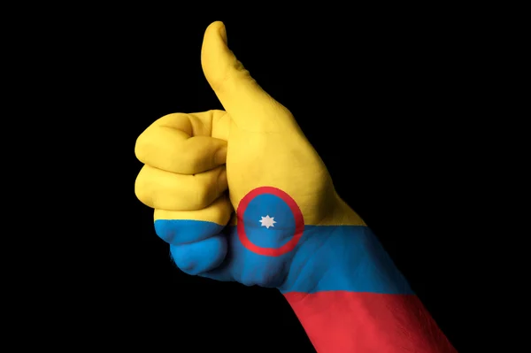 Colombia national flag thumb up gesture for excellence and achie — Stock Photo, Image