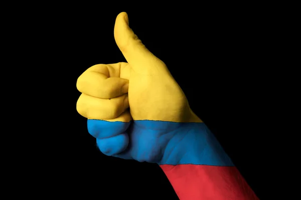 Colombia national flag thumb up gesture for excellence and achie — Stock Photo, Image