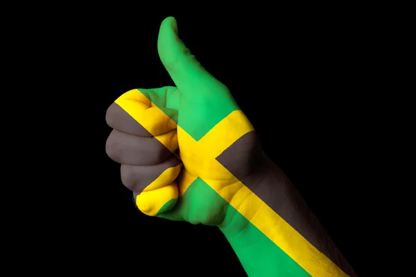 Bandiera nazionale giamaicana pollice in su gesto per l'eccellenza e achiev — Foto Stock