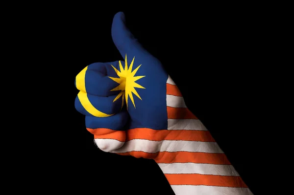 马来西亚国旗拇指手势为追求卓越和很好的实现了 — 图库照片
