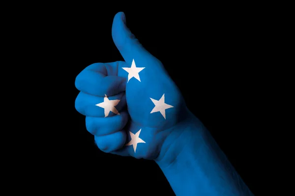 Nationale vlag van Micronesia duim omhoog gebaar naar uitmuntendheid en ach — Stockfoto