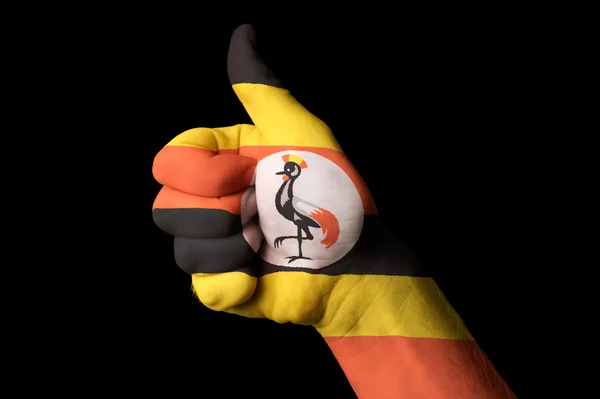 Uganda bandera nacional pulgar hacia arriba gesto por la excelencia y lograr — Foto de Stock
