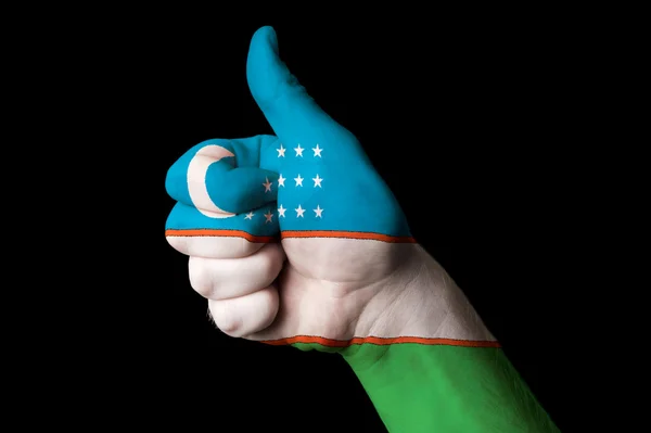 Uzbekistan national flag thumb up gesture for excellence and ach — Stock Photo, Image