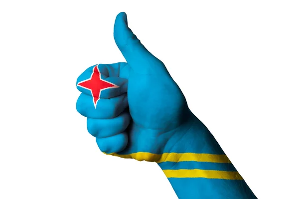 Aruba national flag thumb up gesture for excellence and achievem — Stock Photo, Image