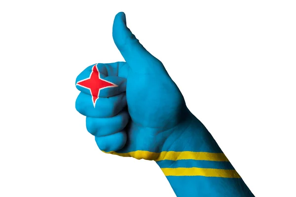 stock image Aruba national flag thumb up gesture for excellence and achievem