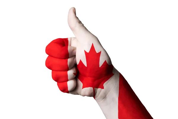 Εθνική σημαία του Καναδά αντίχειρα επάνω χειρονομία για την αριστεία και να επιτύχει — Φωτογραφία Αρχείου
