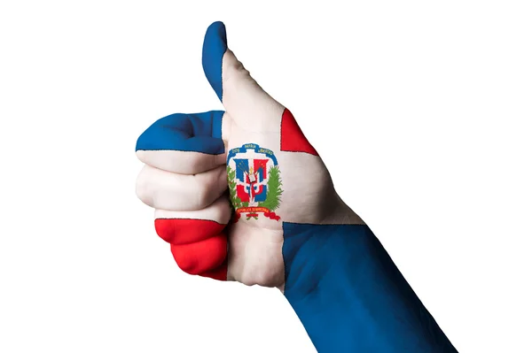 Dominican national flag thumb up gesture for excellence and achi — Stock Photo, Image