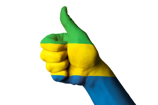 Gabon national flag thumb up gesture for excellence and achievem — Stock Photo, Image