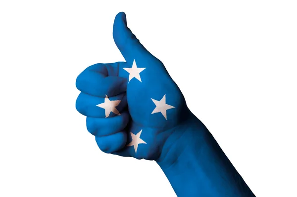Micronesia national flag thumb up gesture for excellence and ach — Stock Photo, Image