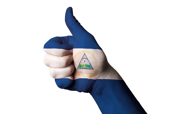 Nicaragua national flag thumb up gesture for excellence and achi — Stock Photo, Image