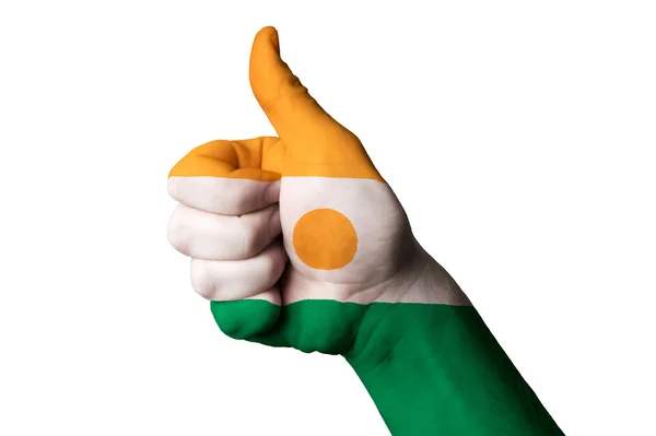 Flaga narodowa Niger kciukiem do góry gest do doskonałości i achievem — Zdjęcie stockowe