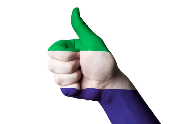 Sierra leone national flag thumb up gesture for excellence and a — Stock Photo, Image