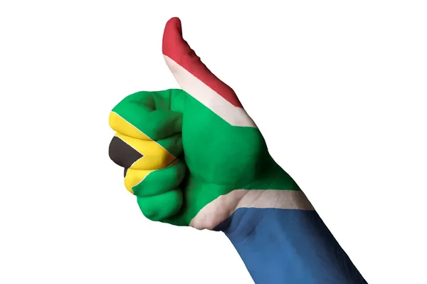 Національний Прапор Південної Африки великий палець вгору жестом за видатні досягнення та — стокове фото