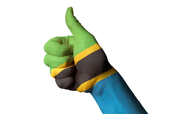 Tanzania national flag thumb up gesture for excellence and achie — Stock Photo, Image
