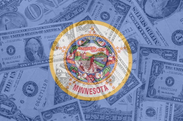 US state of minnesota flag with transparent dollar banknotes in — Stock Photo, Image