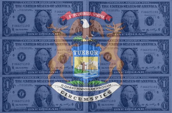 Drapeau de l'État du Michigan des États-Unis avec billets en dollars transparents en b — Photo