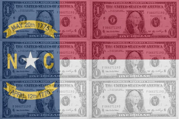 私たちの透明なドル紙幣とノースカロライナ州の旗 — Stock fotografie