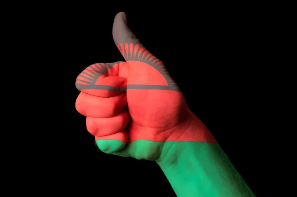 Malawi national flag thumb up gesture for excellence and achieve — Stock Photo, Image